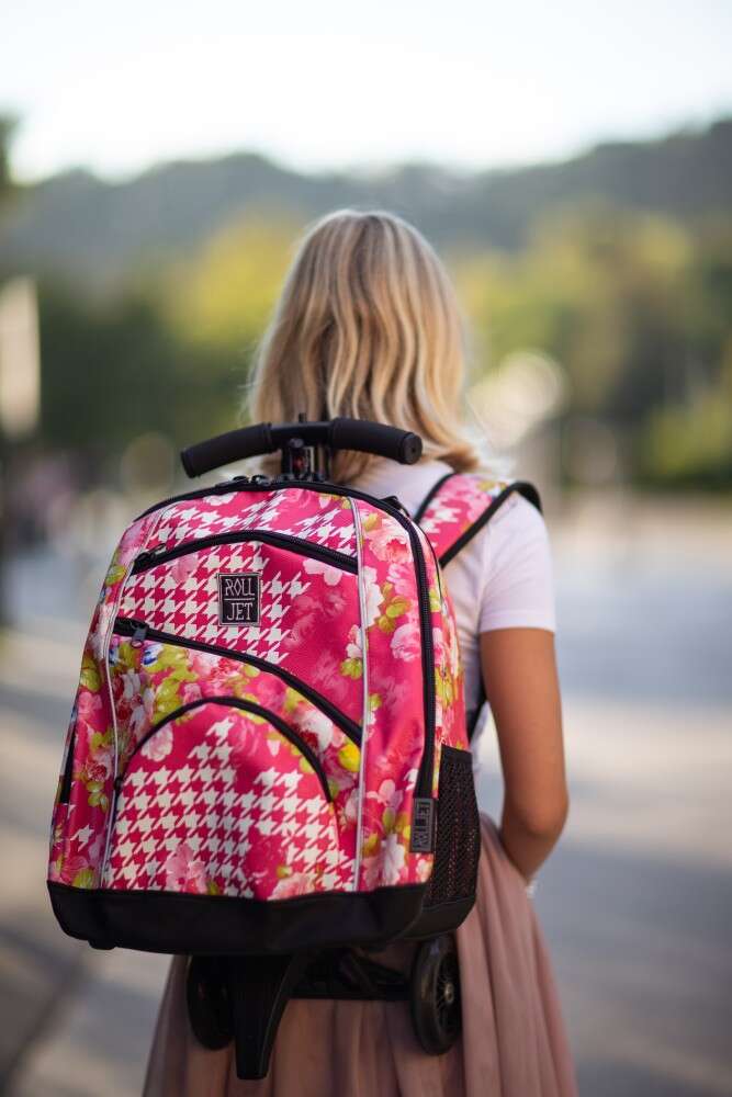 Ali obstaja povezava med pretežko šolsko torbo in učnim uspehom otroka?